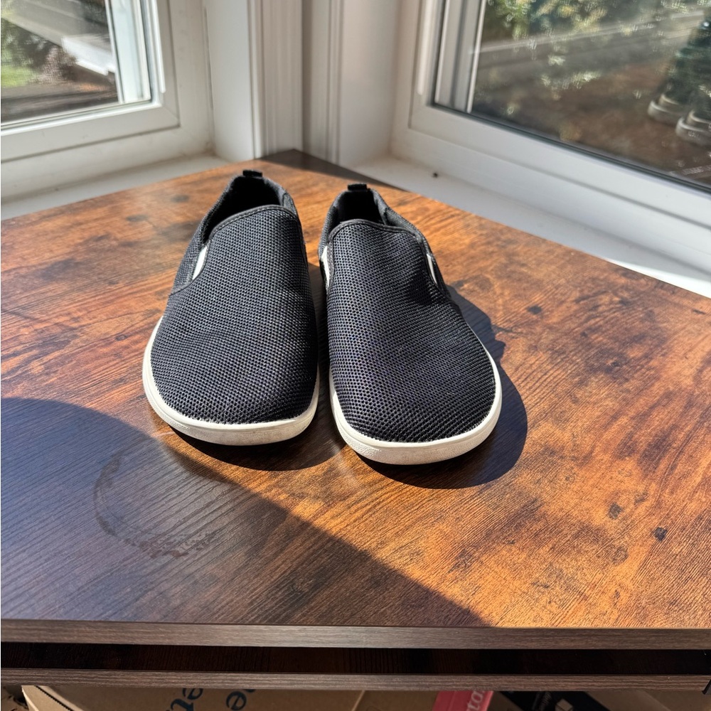 Feel Grounds Minimalist Black Slip-On Sneakers